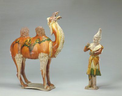 图2唐三彩胡人牵骆驼俑骆驼高70厘米胡人高68厘米北京故宫博物院藏