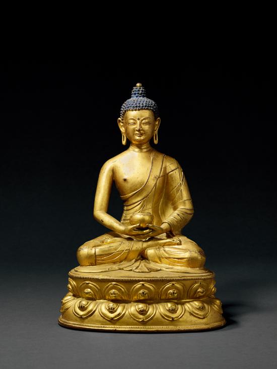 Lot 882 明中期（15-16世纪） 铜鎏金阿弥陀佛 28.6cm。