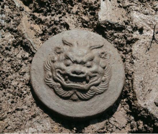 吉林宝马城遗址出土的兽面纹瓦当。（社科院考古所供图）