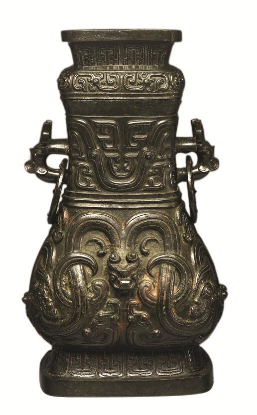 （图7-1）中国国家博物馆藏西周晚期颂壶，失盖，高51.7厘米，造型相同。
